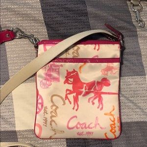 adjustable 2 pocket crossbody purse from Coach!